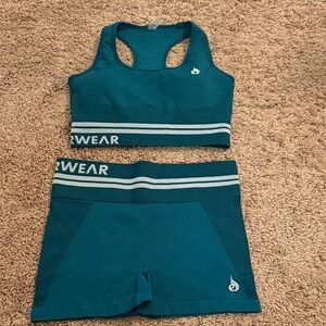 RYDERWEAR Women's Teal Sports Bra and Shorts Set